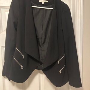 Black Jacket. Hits at waist with Faux Zippers Embellishment,